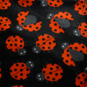 Ladybugs on Black Anti-pill Fleece Fabric