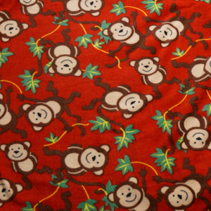 Monkeys on Red Anti-pill Fleece Fabric
